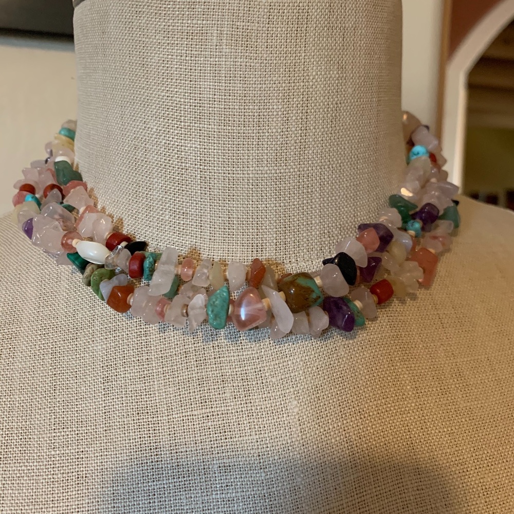 Triple strand bead necklace